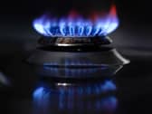 A view of a lighted gas hob