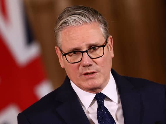 Sir Keir Starmer in front of a Union flag