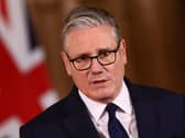 Sir Keir Starmer in front of a Union flag