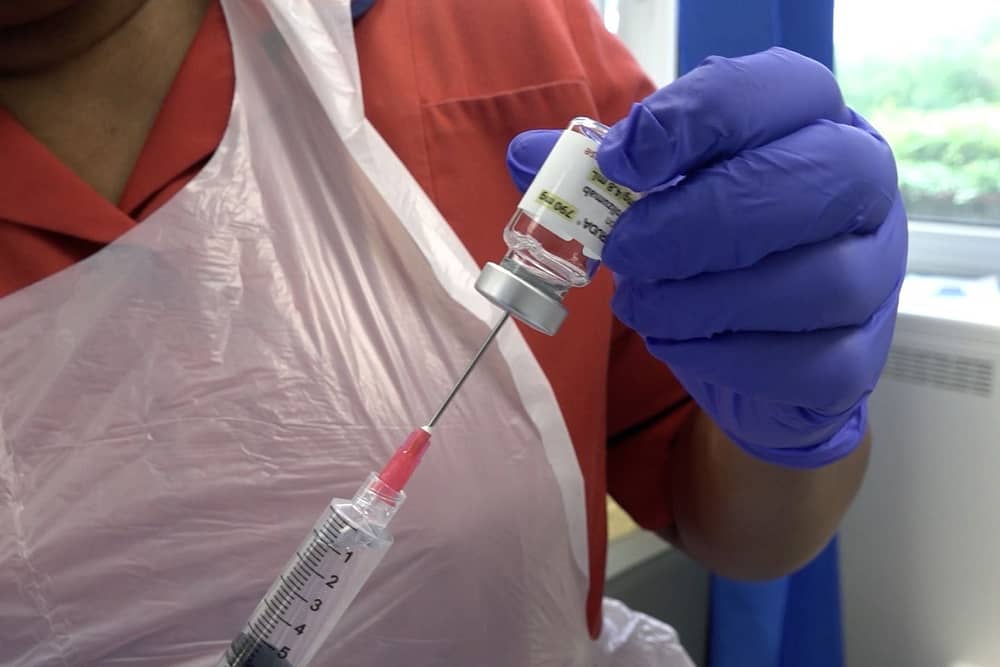 Close-up of a nurse preparing a new one-minute injection for more than a dozen cancers