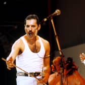 Freddie Mercury of Queen on stage