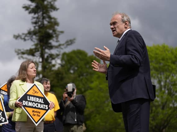 Sir Ed Davey speaking in front of Liberal Democrat activists