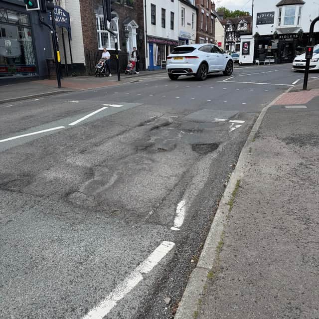 The state of the road outside Perry & Phillips in Bridgnorth