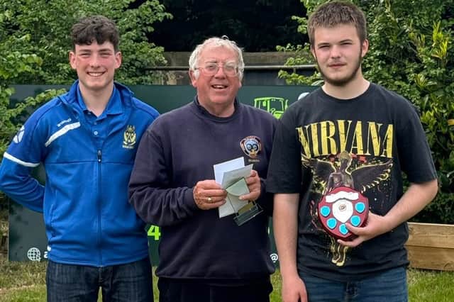 Junior joy - main finalists Myles Fisher and (right) winner Jack Cooke with Tilstock's Simon Fullard