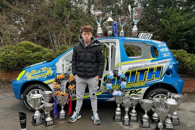Rhys Tipton, 17, with his numerous trophies from success in autograss racing