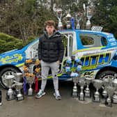 Rhys Tipton, 17, with his numerous trophies from success in autograss racing