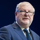 Head and shoulders photo of Angus Robertson