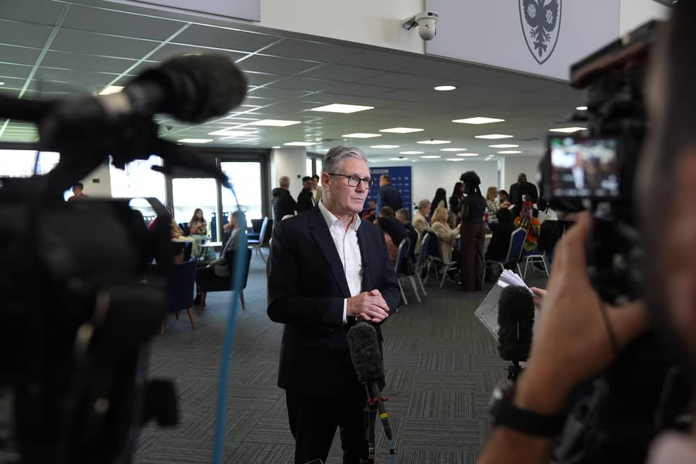 Prime Minister Sir Keir Starmer speaking to the media after meeting Labour Party members during a visit to AFC Wimbledon in south London