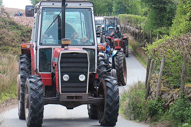 Rob Gore with his faithful friend for company in his MF690