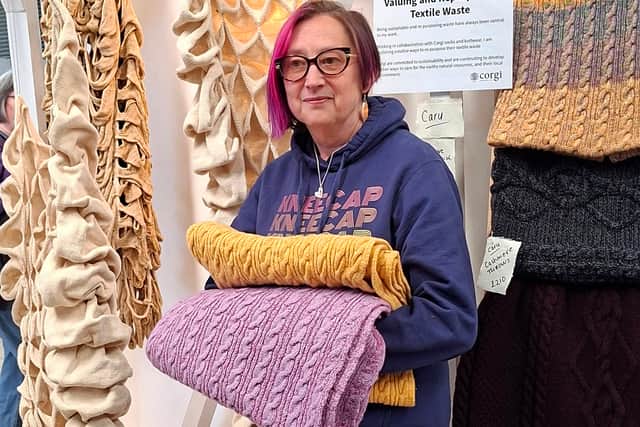 Joy Franklin with some of her products made from recycled textiles.