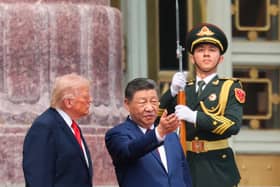 Chinese President Xi Jinping attends a welcome ceremony with US President Donald Trump, left, at the Great Hall of the People in Beijing