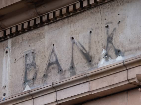 The remains of a bank sign