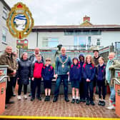 A representative selection of the youngsters who have worked on the tiles for the Croseo site with Builth Wells Mayor Councillor Mark Hammond centre, Deputy Mayor Councillor Alan Waller on the left, Isaac Coe and Alex and Blue Macaskill.