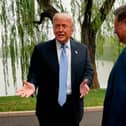 US President Donald Trump, left, and Chinese President Xi Jinping at Zhongnanhai Garden in Beijing