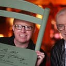 Tommy Fleming holding a chair