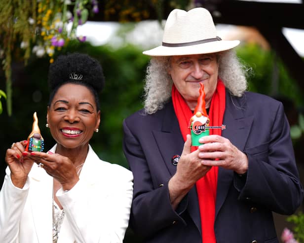 Baroness Floella Benjamin and Sir Brian May holding the gnomes they painted to raise money for the RHS Campaign for School Gardening at the RHS and The King’s Foundation Curious Garden exhibit, during press day at the RHS Chelsea Flower Show, at the Royal Hospital Chelsea in London