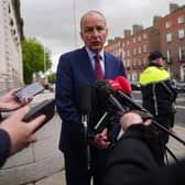 Taoiseach Micheal Martin speaks to the media as he arrives for a Cabinet meeting at Government Buildings in Dublin