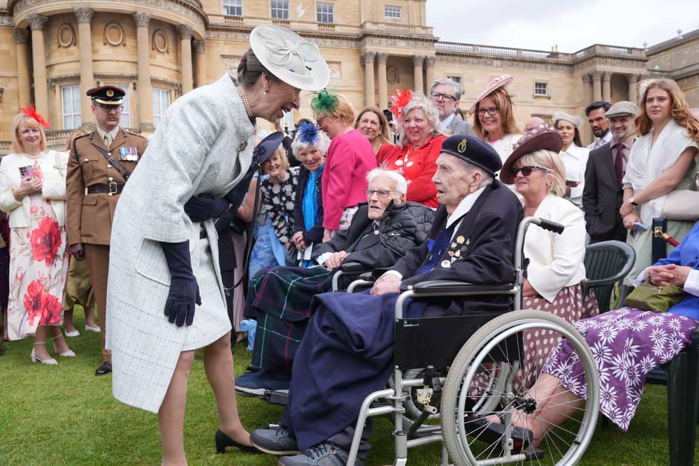 The Princess Royal speaking to veteran Robert Piper in the Buckingham Palace garden
