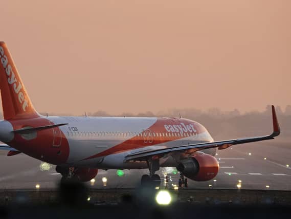 An easyJet plane taxies before take-off at Gatwick Airport