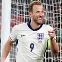 Harry Kane celebrates scoring for England