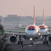 EasyJet planes queue to take off at Gatwick Airport