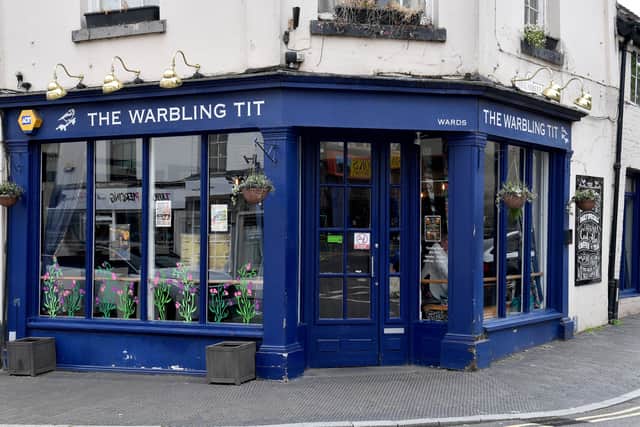 The Warbling Tit has a notable look in an historic building