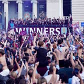 Aston Villa fans celebrate during the Europa League winners parade in Birmingham