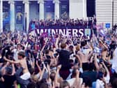 Aston Villa fans celebrate during the Europa League winners parade in Birmingham