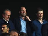 The Prince of Wales smiles during Aston Villa's Europa League final match
