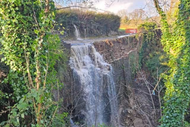 Heavy rain and melting snow saw water pour over the bridge instead of through a culvert