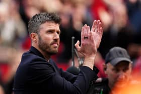 Manchester United manager Michael Carrick applauds