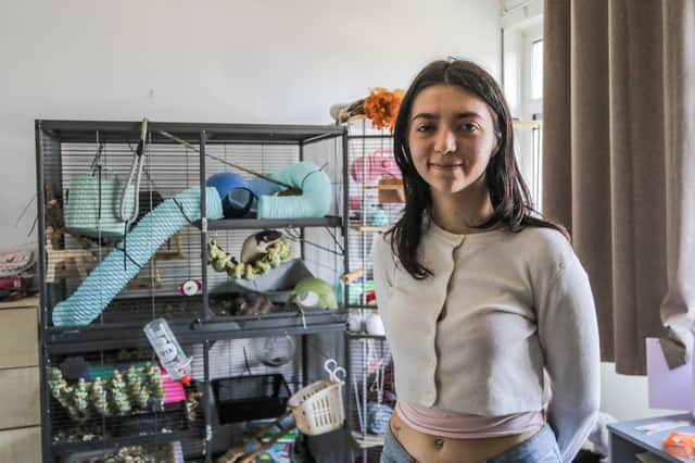 Ella Woodland with one of her pet rats in Worcestershire