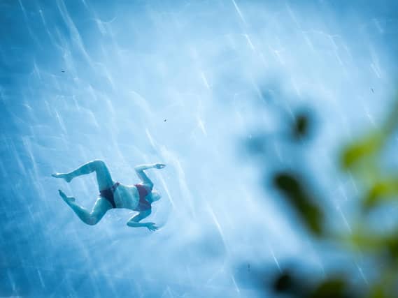 Swimmer in sky pool