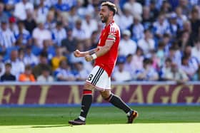 Manchester United’s Bruno Fernandes celebrates after scoring at Brighton