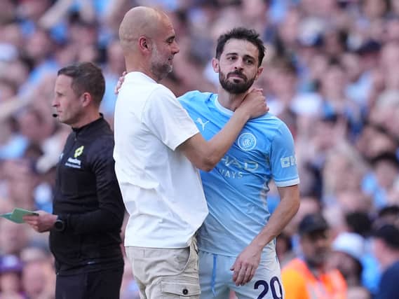 Pep Guardiola embraces Bernardo Silva after his substitution