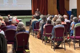Powys County Councillor Jeremy Thorp leads the discussion at Knighton Community Centre after the People's Emergency Briefing film.