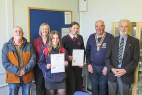 (L-R) Rotarian Ciaran O’Connell, Head of English: Anwen Nicholls,  Martha Jones, Matilda Batten, Rotary President Hugh Garner, and Rotarian Arthur Harries