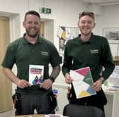 Advanced craft electrician Ryan Donegani (left) and electrician apprentice Angus Fleming from Housing Plus Group