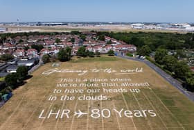 View from above of a field which has a poem writing on it