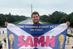 Craig Ferguson holding a saltire in Washington DC