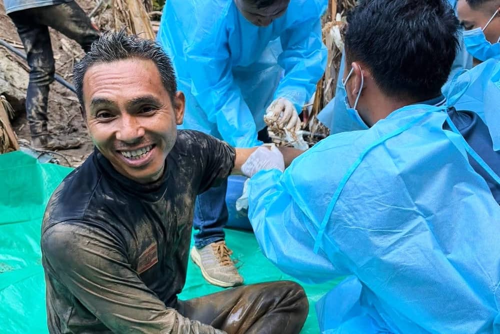 A rescuer celebrating