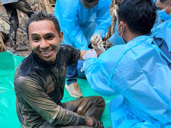 A rescuer celebrating