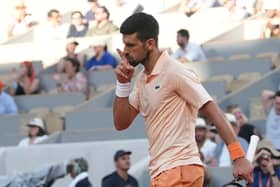 Novak Djokovic shushes the crowd