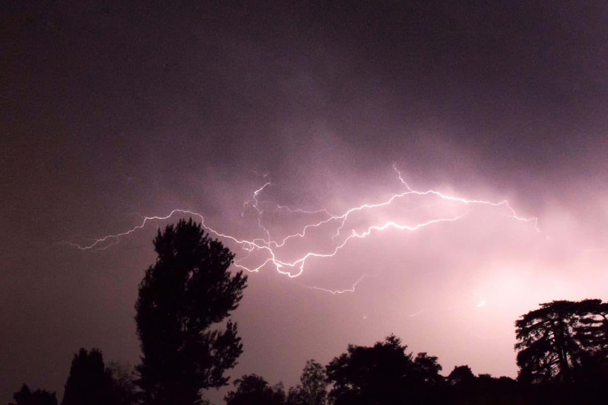Moment lightning bolt strikes roof sparking huge blaze