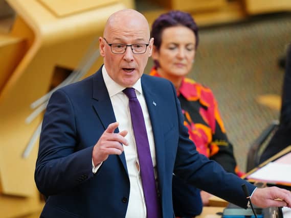 John Swinney speaks during First Minister's Questions