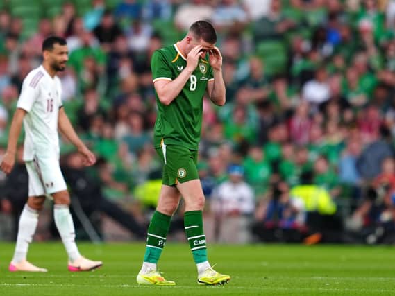 Republic of Ireland’s Jack Moylan leaves the pitch after being shown a red card against Qatar
