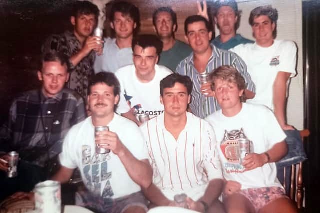 English football fans, mostly from Stourbridge area, who went to follow England in the 1986 World Cup in Mexico, pictured in Dallas early in the campaign. Back row, second from left, is Stuart Bates, aka Batesy; back row, far right in white T shirt, is Steve Dawson, aka Texas Steve, an American they met and befriended; middle row, right with striped shirt, is Gary Allen, aka Adder, who lives now in Atlanta and supplied the picture.