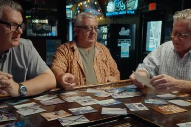 Sharing memories, from left, Stuart Bates, Gary Allen, and Steve Dawson.