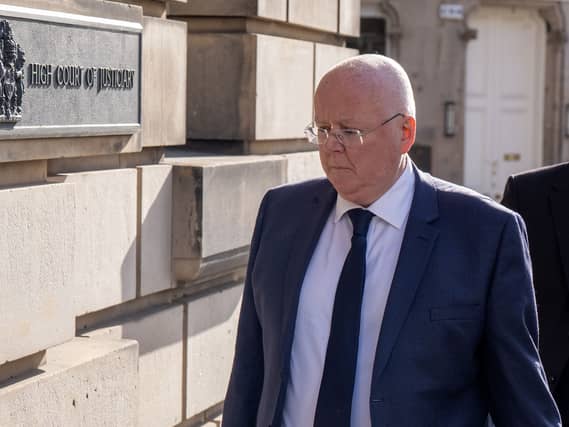 Peter Murrell walking outside court