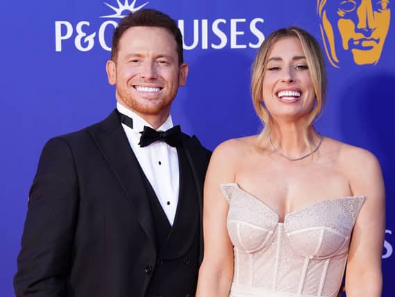 Joe Swash and Stacey Solomon watched on at Arsenal's trophy parade